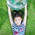 Girl holding a globe