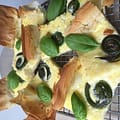 fiddlehead tart in slices and served on a wire rack