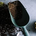 Potting soil and spade | Harrowsmith Magazine